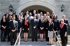Group of Stewart fellows standing outside a building.